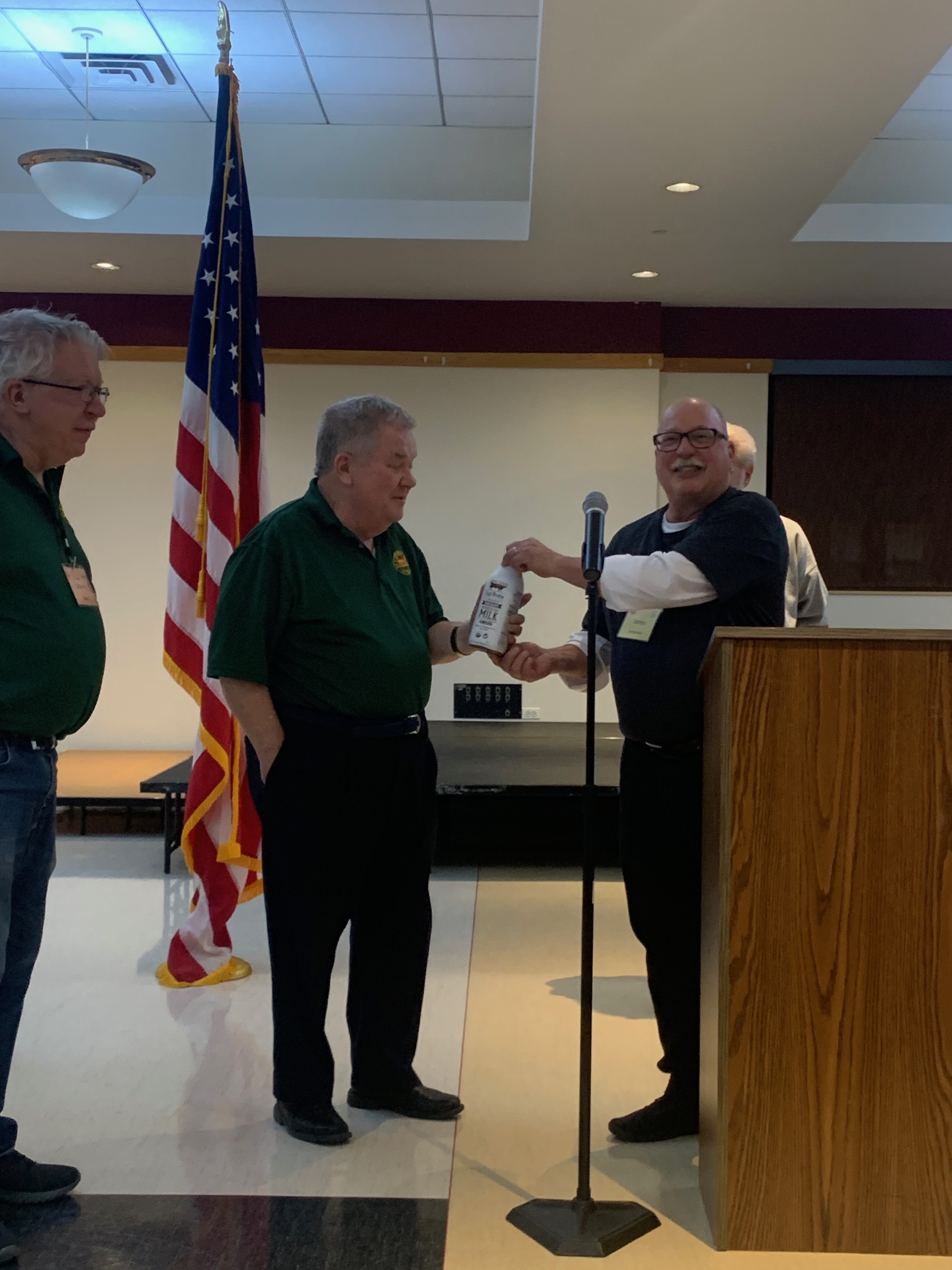 Fr Bill receiving chocolate Milk