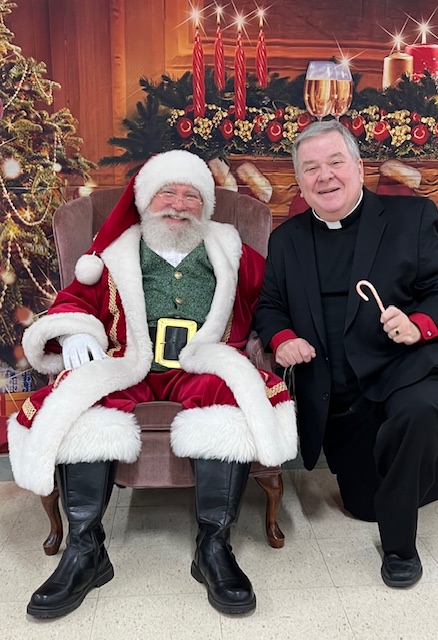 Fr. Corcoran with Santa